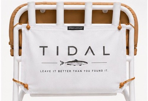 A white Tidal bag rigged to a boat's leaning-post rails with caramel marine bungees